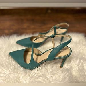 Beautiful teal slingback heals.